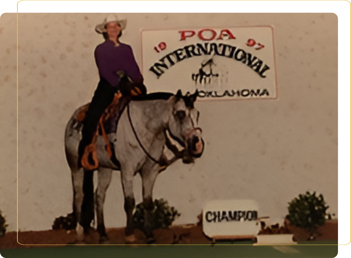 A painting of a woman on horseback with the words " poa international oklahoma 1 9 9 7 champion ".